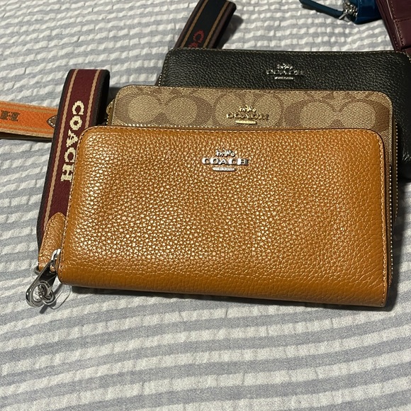 $90 EACH. Coach wristlet. Larger wallet use. Available in brown and black - Picture 6 of 6